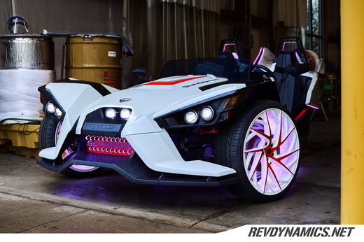 Polaris Slingshot With Custom White and Red Lexani Wheels