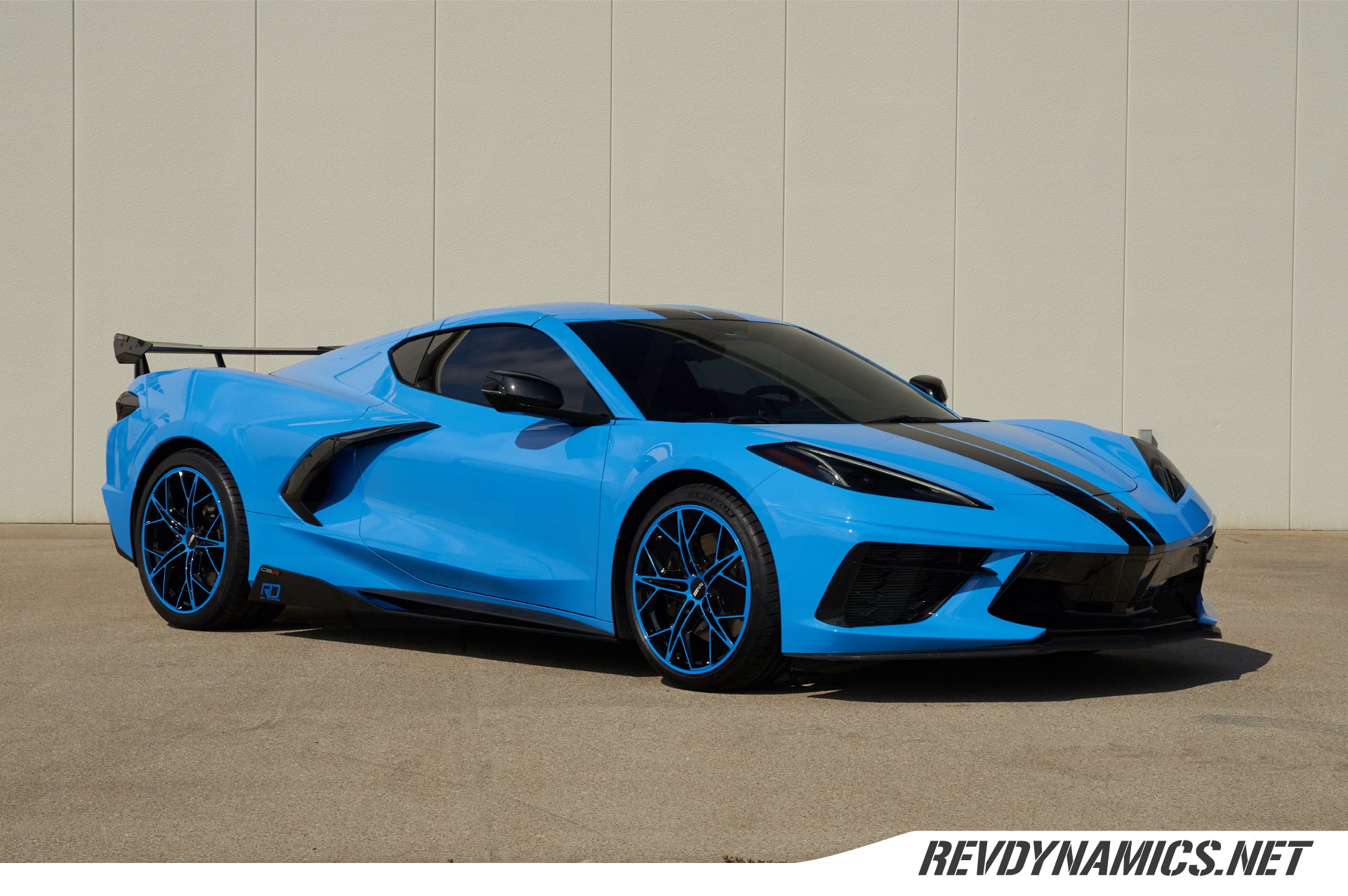C8 Corvette Stingray with Rapid blue and black rims