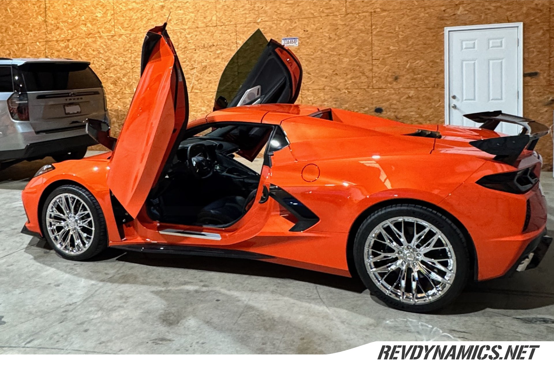 Corvette C8 with Chrome Lexani Aries 19in front and 20in rear wheels Amplify Orange