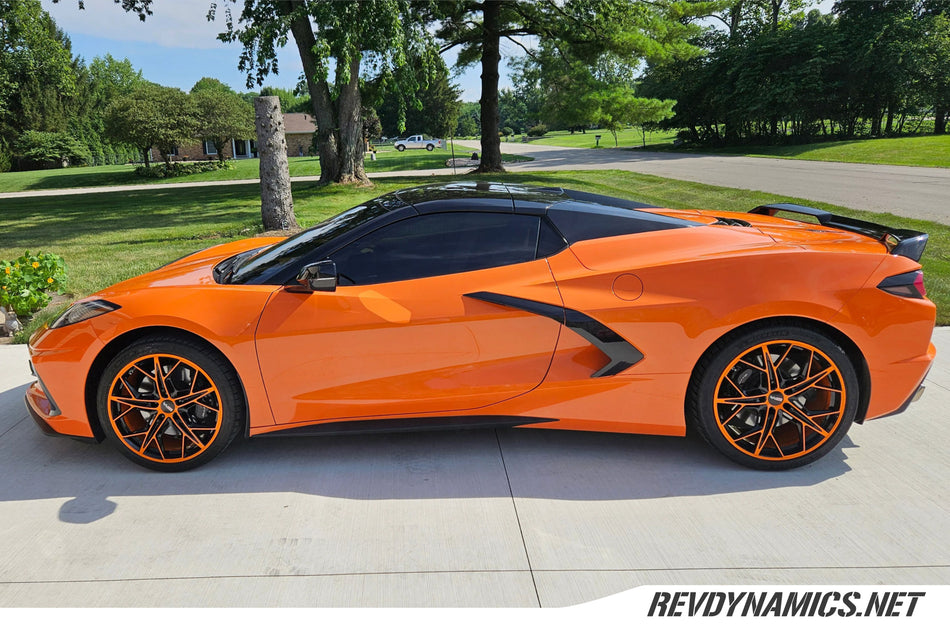 Corvette C8 with 19 and 20 in staggered cray hammerhead amplified orange and black wheels by rev dynamics