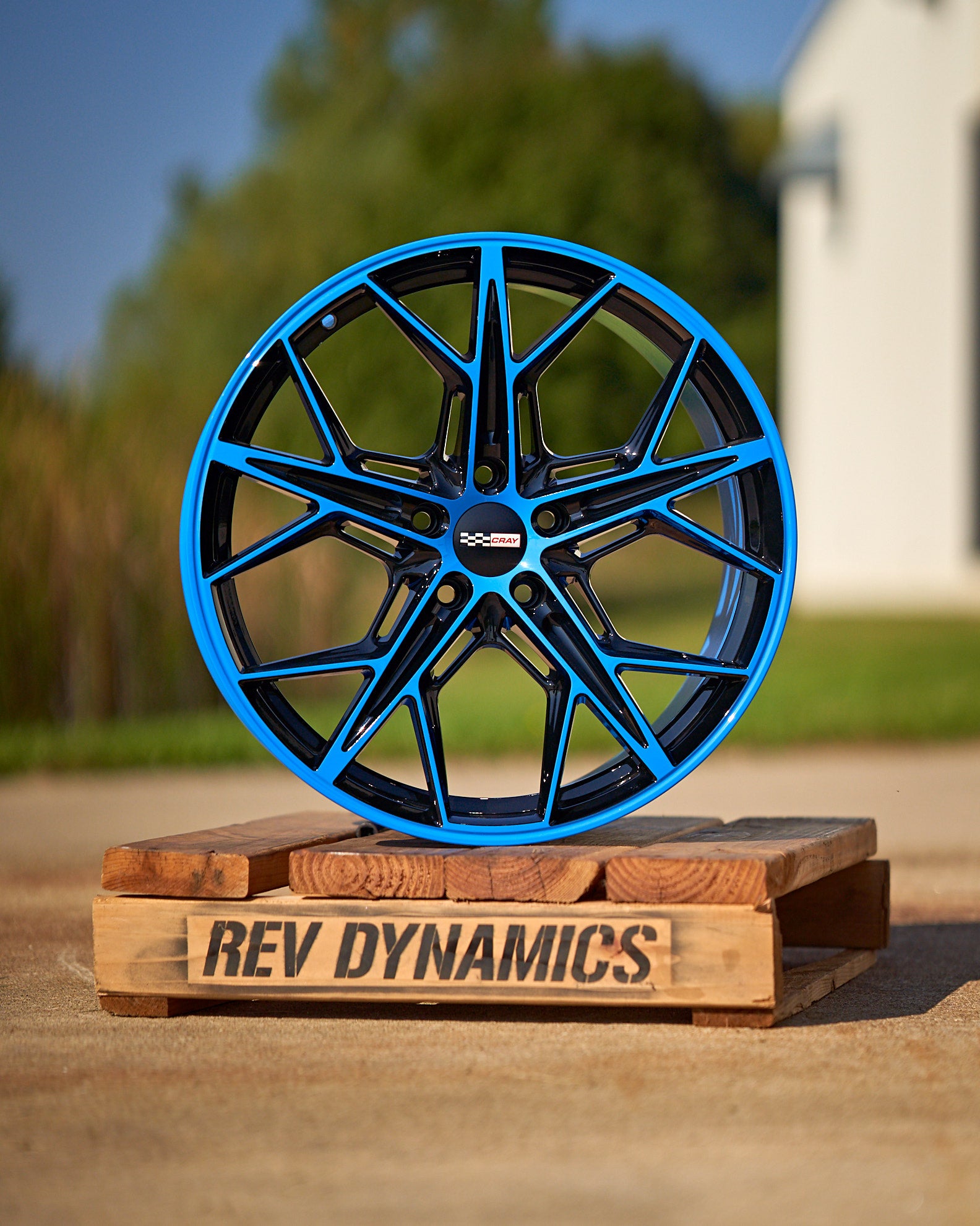 Corvette C8 Rapid blue and black wheel and tire package 20in