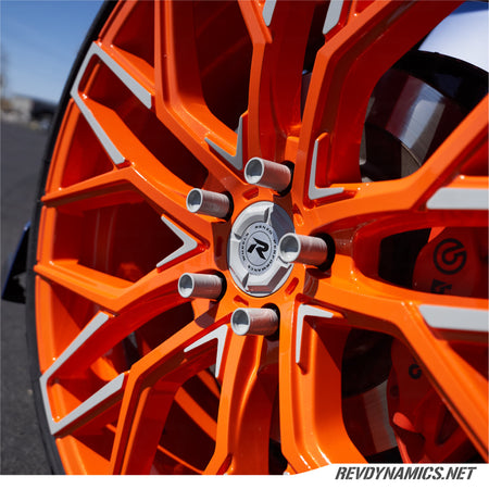 Polaris Slingshot with color matched tuner style lug nuts