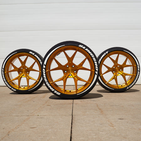 Polaris Slingshot White tire lettering on gold rohana wheels