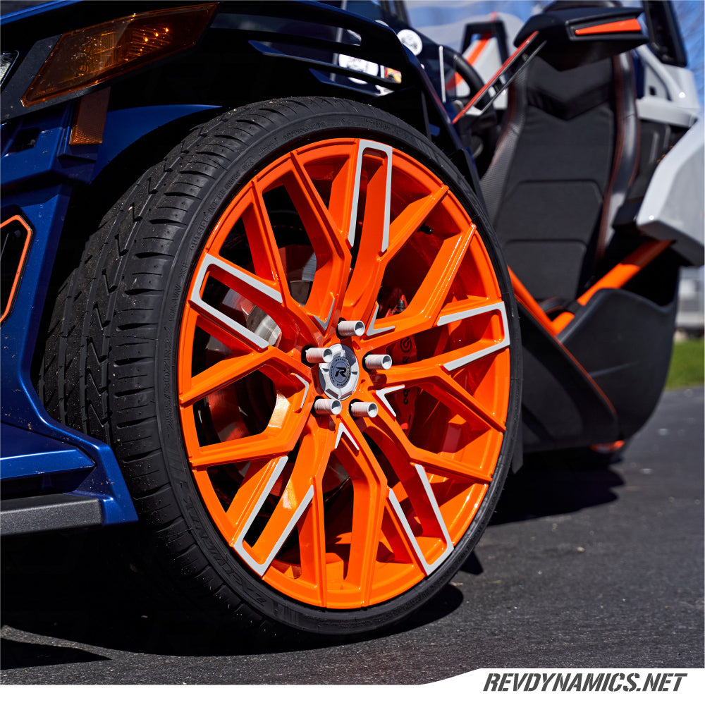 Polaris Slingshot with color matched tuner style lug nuts